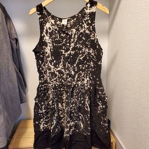 Edgy bleach spotted black dress